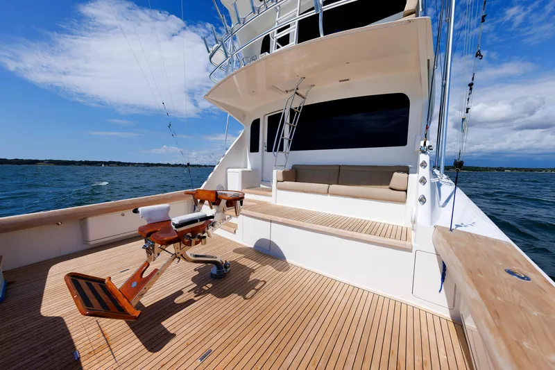 On Ice Yacht Photos Pics 2009 Viking 74 Enclosed Bridge yacht with spacious deck and fishing chair.