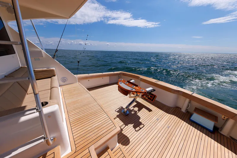 On Ice Yacht Photos Pics Luxurious 2009 Viking 74 Enclosed Bridge yacht deck with ocean view.