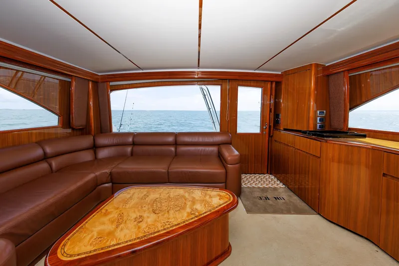 On Ice Yacht Photos Pics Luxurious interior of 2009 Viking 74 Enclosed Bridge yacht with ocean view.