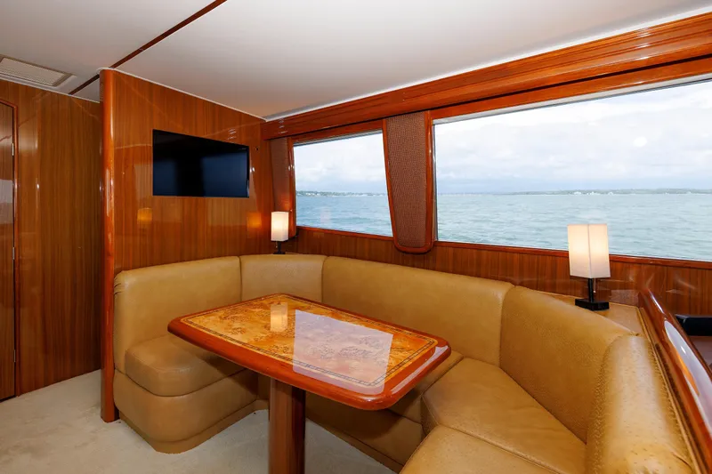 On Ice Yacht Photos Pics Luxurious interior of 2009 Viking 74 Enclosed Bridge yacht with ocean view.