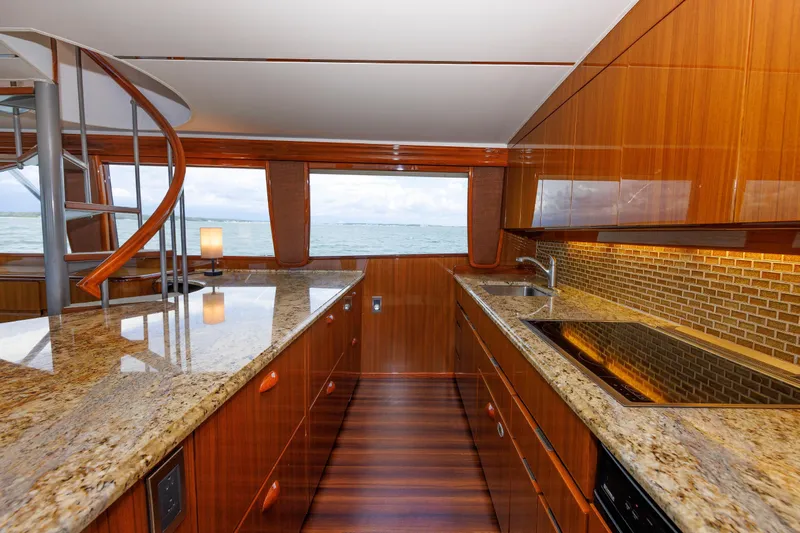 On Ice Yacht Photos Pics Luxurious kitchen interior of 2009 Viking 74 Enclosed Bridge yacht with ocean view.