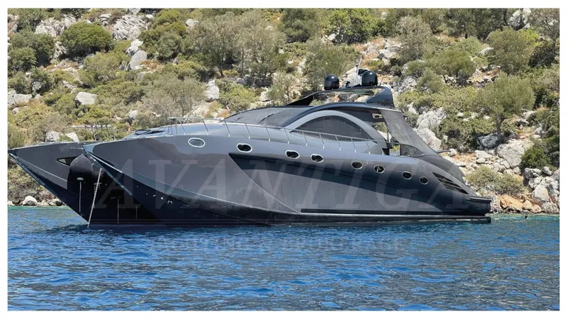  Yacht Photos Pics 2014 Catamaran Power Catamaran in scenic coastal waters, sleek black design.