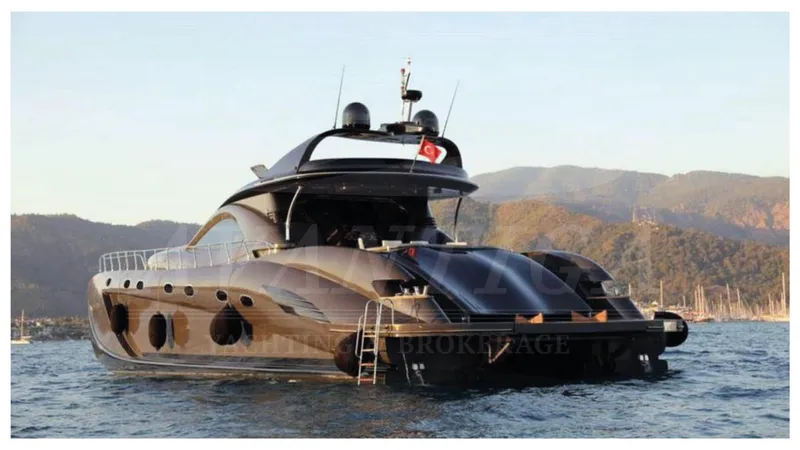  Yacht Photos Pics 2014 Catamaran Power Catamaran on water, scenic mountain backdrop.