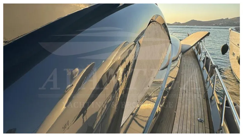  Yacht Photos Pics 2014 Catamaran Power Catamaran with sleek design, docked at sunset.