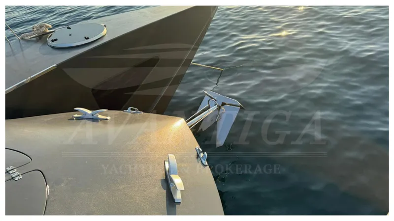  Yacht Photos Pics 2014 Catamaran Power Catamaran anchored on calm water at sunset.