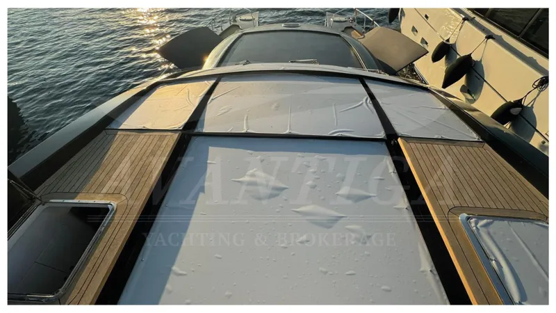  Yacht Photos Pics 2014 Catamaran Power Catamaran with sleek deck design, docked by the water.