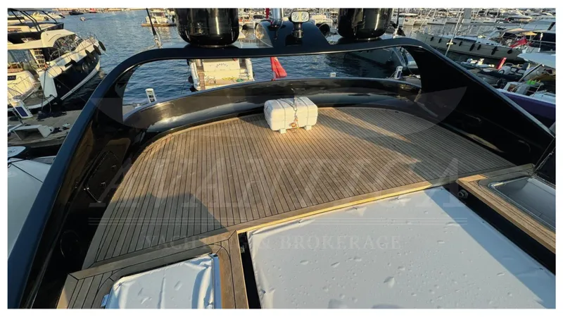  Yacht Photos Pics 2014 Catamaran Power Catamaran with spacious wooden deck at marina.