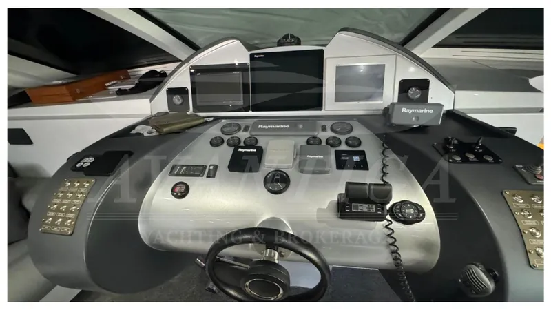  Yacht Photos Pics 2014 Catamaran Power Catamaran helm with advanced navigation controls and displays.