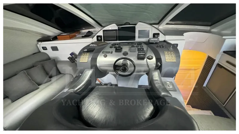  Yacht Photos Pics 2014 Catamaran Power Catamaran cockpit with modern controls and navigation systems.