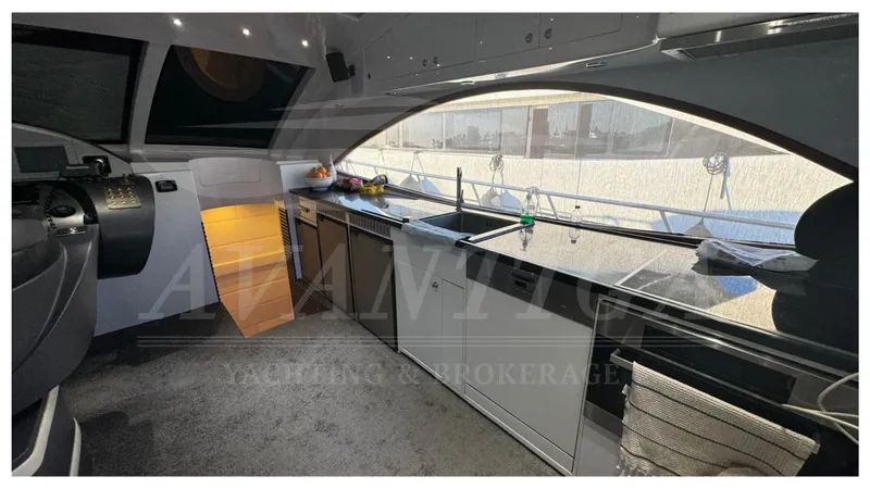  Yacht Photos Pics Interior of 2014 Catamaran Power Catamaran with modern kitchen and panoramic window.