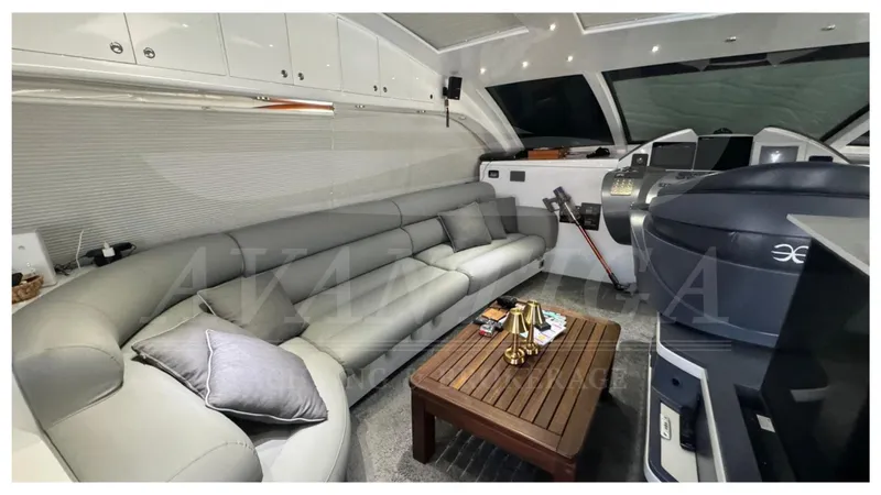  Yacht Photos Pics Luxurious interior of a 2014 Catamaran Power Catamaran with plush seating and modern decor.