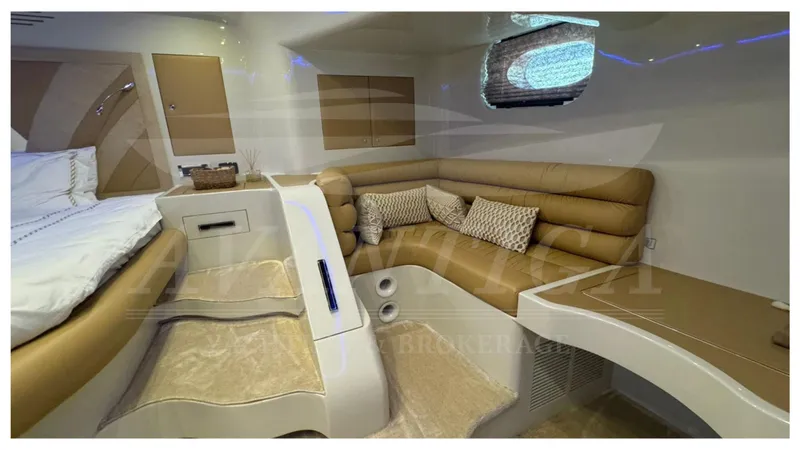  Yacht Photos Pics Luxurious interior of 2014 Catamaran Power Catamaran with plush seating and modern design.