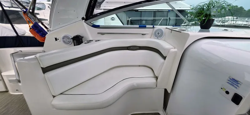  Yacht Photos Pics 2007 Rinker 350 Express boat interior with white seating and modern design.