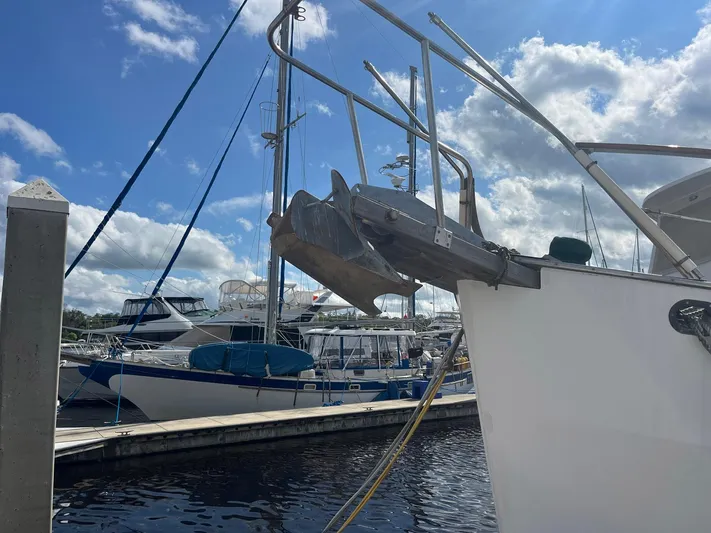 Anna Marie Yacht Photos Pics 1987 Kadey-Krogen 42 yacht docked at marina under blue sky.