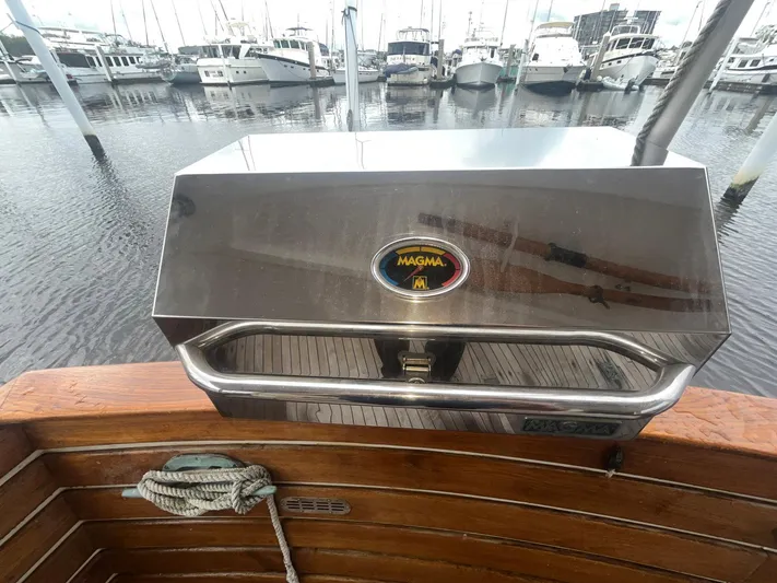 Anna Marie Yacht Photos Pics Stainless steel Magma grill on 1987 Kadey-Krogen 42 yacht, docked at marina.