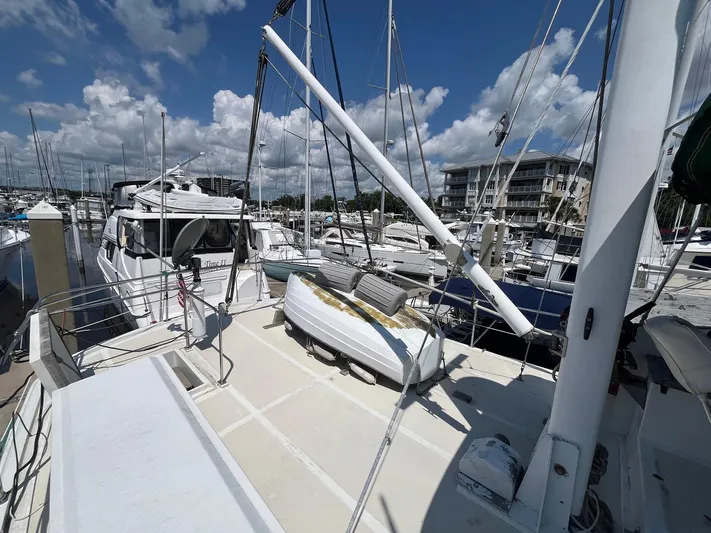 Anna Marie Yacht Photos Pics 1987 Kadey-Krogen 42 yacht docked at marina under blue sky.