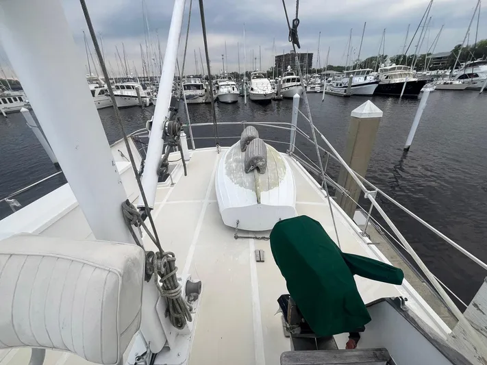 Anna Marie Yacht Photos Pics 1987 Kadey-Krogen 42 yacht deck view at marina, surrounded by boats.