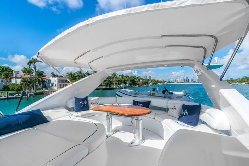  Yacht Photos Pics Luxurious 2001 Azimut Sea Jet yacht with spacious deck and scenic waterfront view.