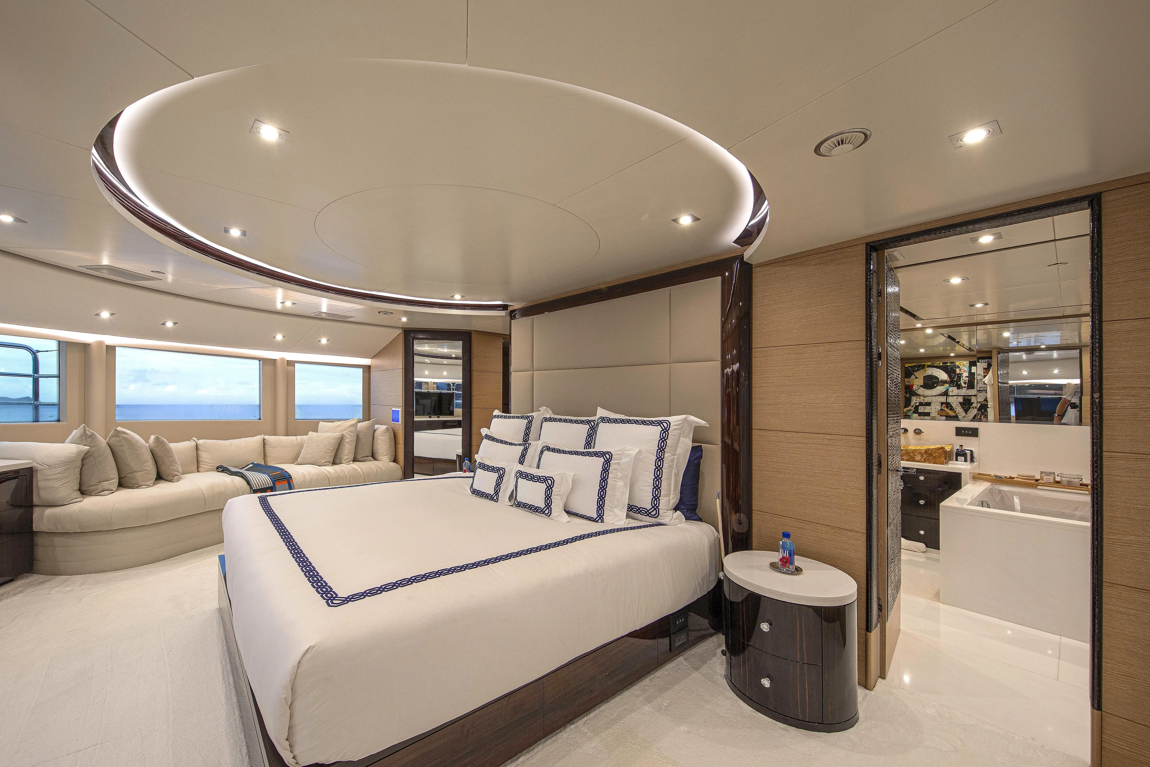 Sur La Mer Yacht Photos Pics Luxurious bedroom interior of 2011 Benetti Vision 145 yacht with elegant decor and ocean view.