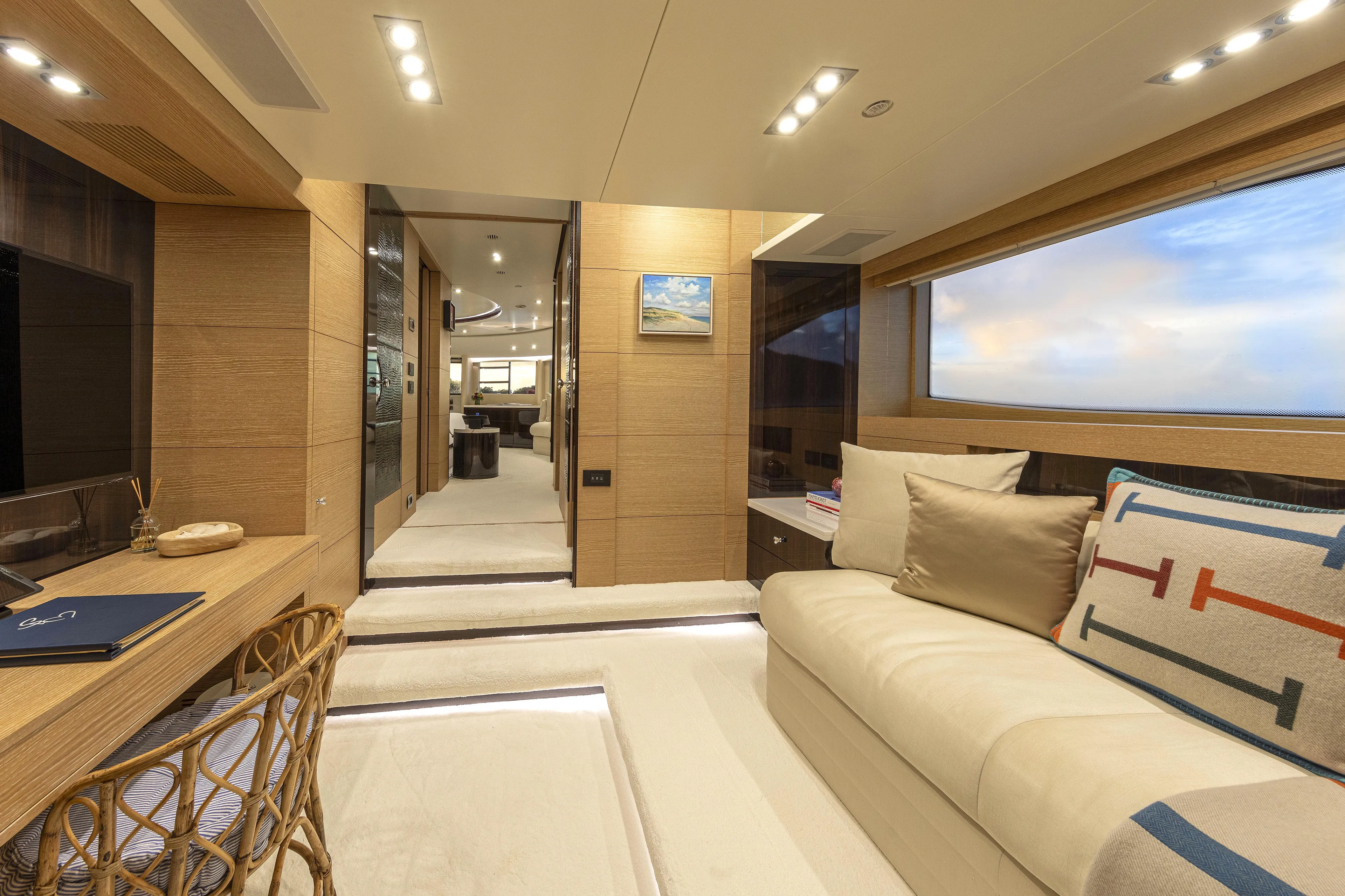 Sur La Mer Yacht Photos Pics Luxurious interior of 2011 Benetti Vision 145 yacht with modern furnishings and large windows.