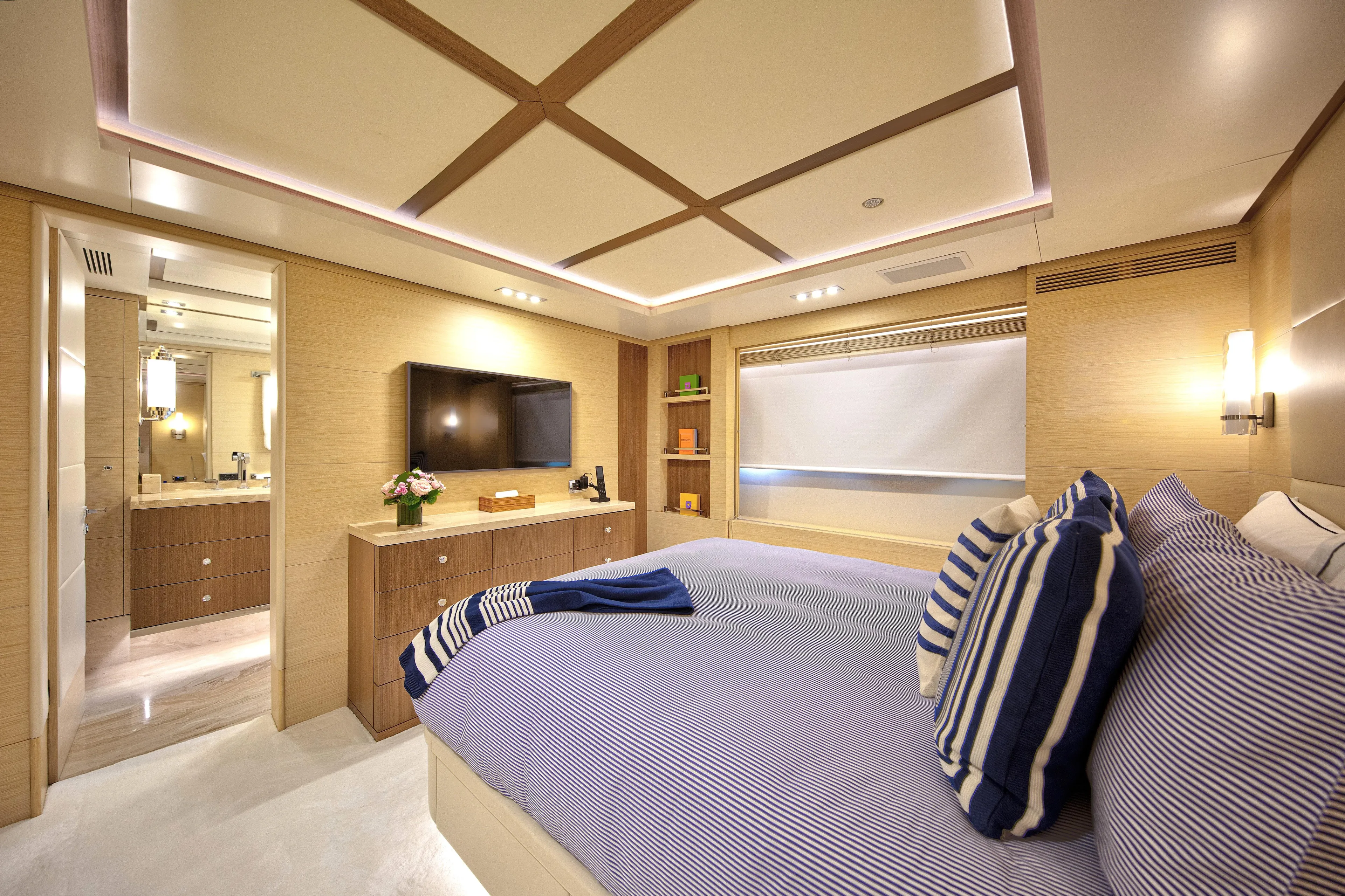 Sur La Mer Yacht Photos Pics Luxurious bedroom interior on 2011 Benetti Vision 145 yacht, featuring elegant decor and modern amenities.