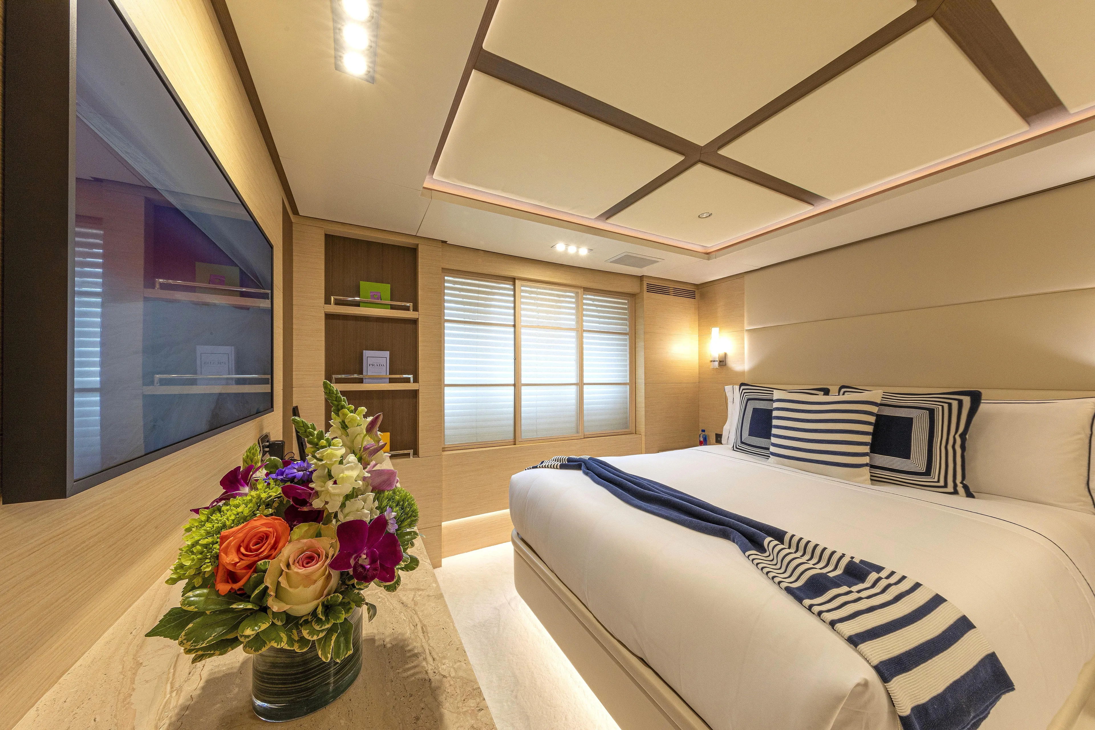 Sur La Mer Yacht Photos Pics Luxurious bedroom interior on 2011 Benetti Vision 145 yacht with elegant decor and floral arrangement.