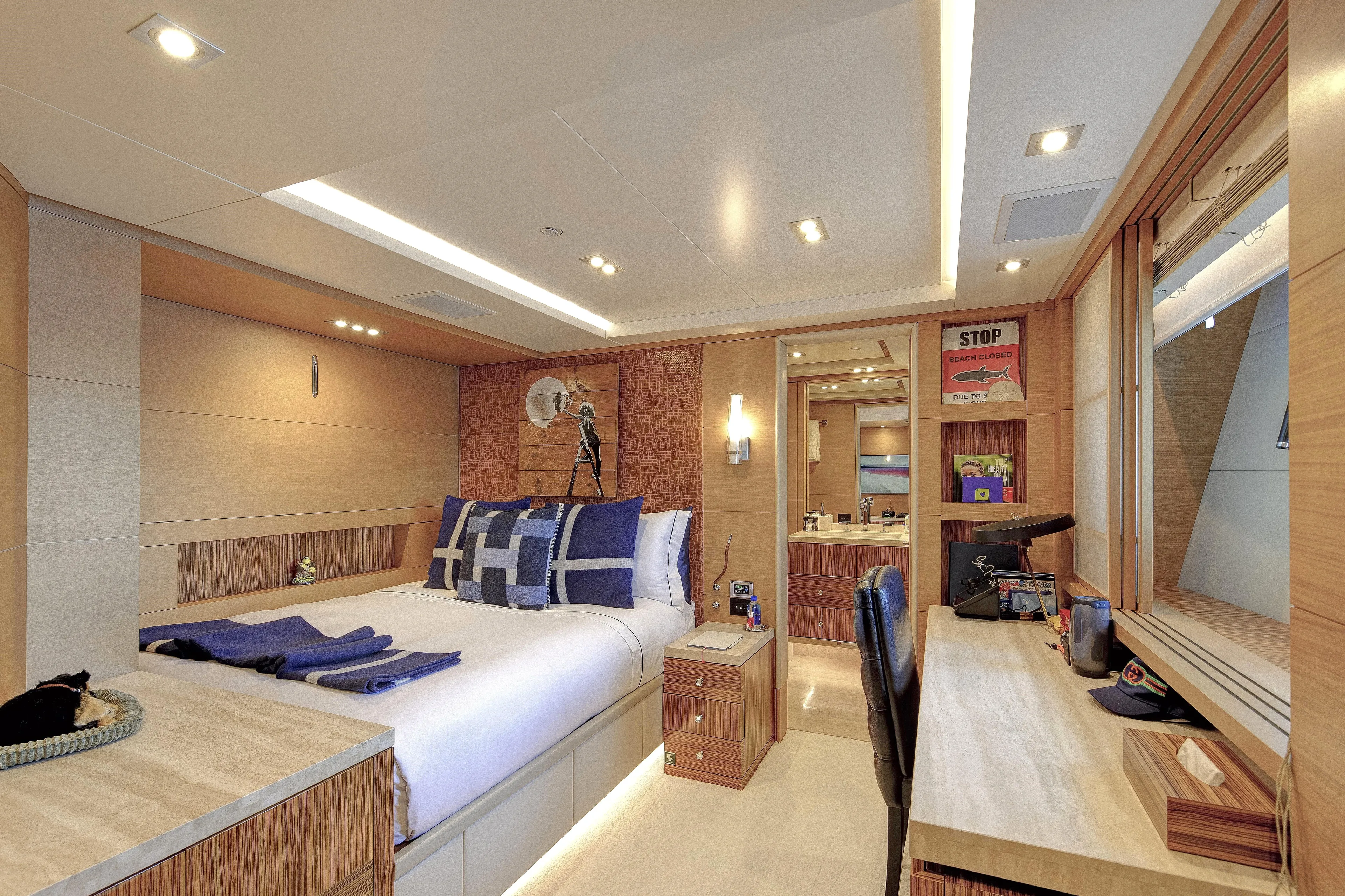 Sur La Mer Yacht Photos Pics Luxurious bedroom interior on 2011 Benetti Vision 145 yacht, featuring modern design and elegant furnishings.