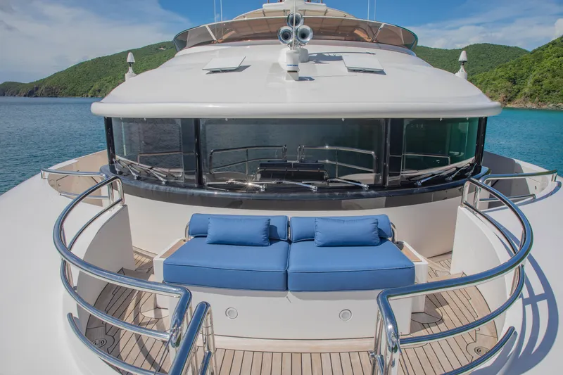 Sur La Mer Yacht Photos Pics Luxury Benetti Vision 145 yacht deck with blue seating, ocean view, 2011 model.