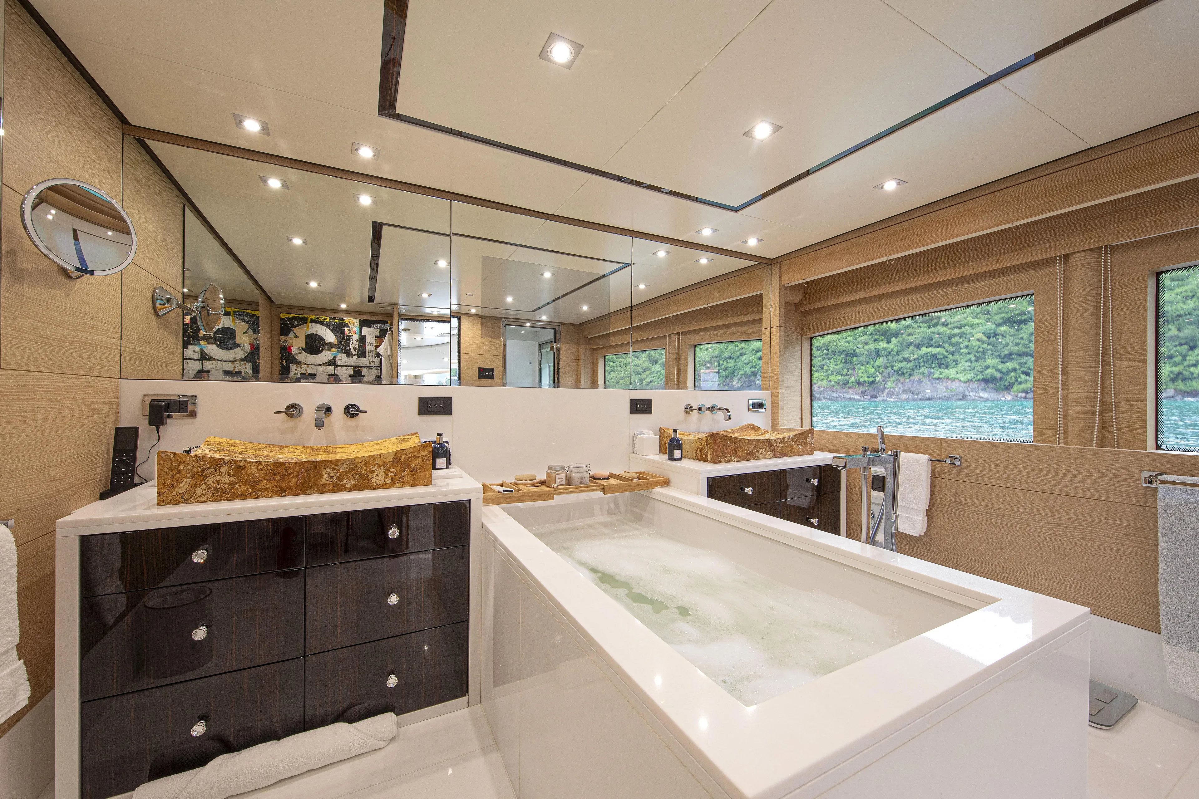 Sur La Mer Yacht Photos Pics Luxurious bathroom on 2011 Benetti Vision 145 yacht with elegant fixtures and scenic views.