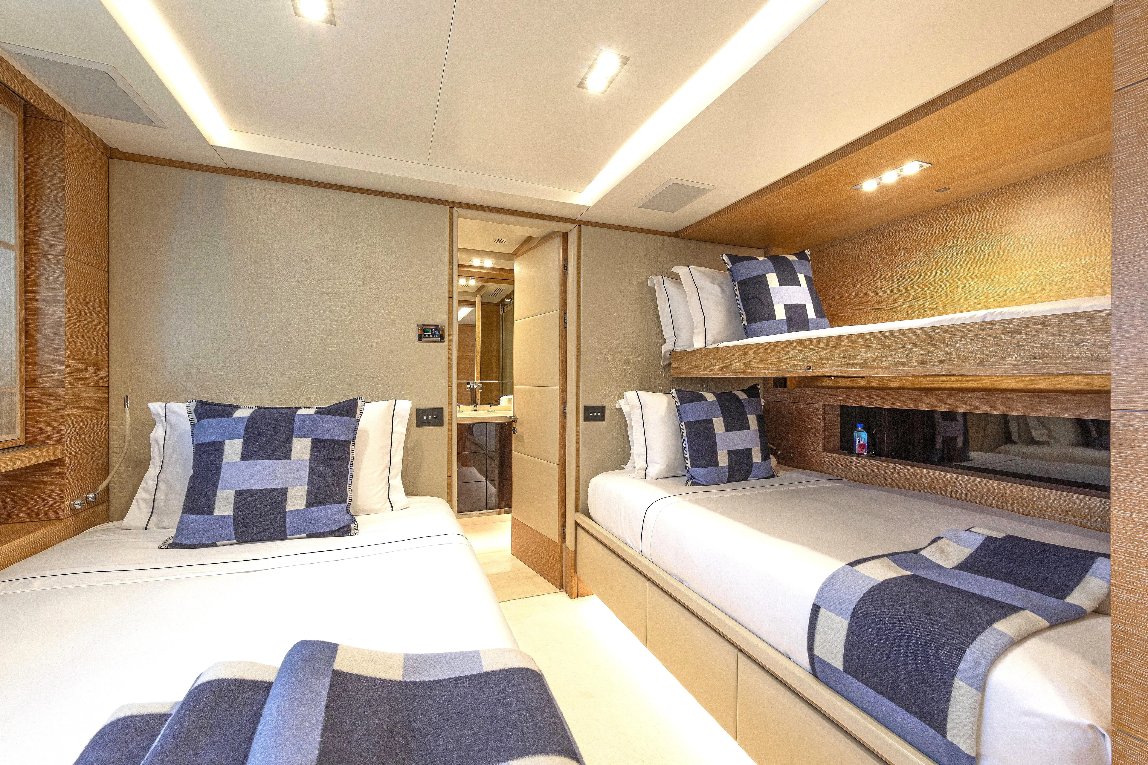 Sur La Mer Yacht Photos Pics Luxurious cabin interior of 2011 Benetti Vision 145 yacht with modern bedding.