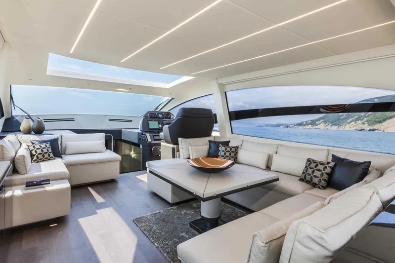  Yacht Photos Pics Luxurious interior of 2018 Pershing 7X yacht with modern seating and ocean view.