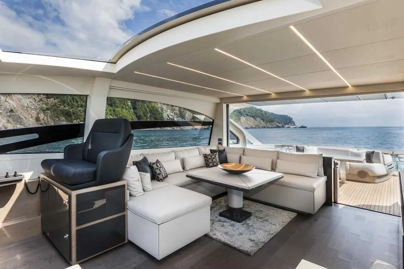  Yacht Photos Pics Luxurious interior of 2018 Pershing 7X yacht with ocean view and elegant seating area.