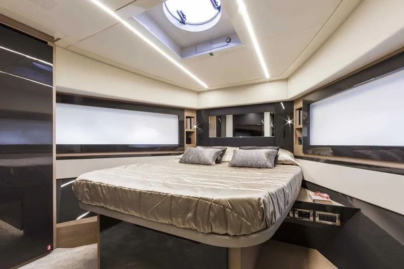  Yacht Photos Pics Luxurious bedroom interior of 2018 Pershing 7X yacht with modern design and elegant lighting.