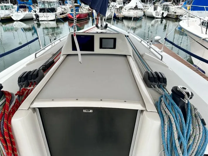 "legacy" Yacht Photos Pics 2006 J Boats J/109 sailboat deck with ropes and marina view.