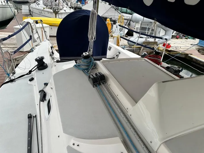 "legacy" Yacht Photos Pics 2006 J Boats J/109 sailboat deck with rigging and winches at a marina.