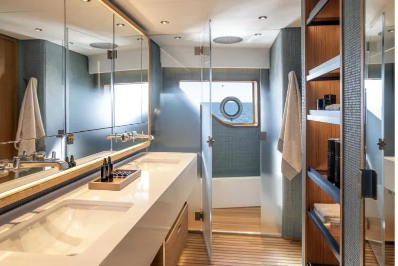  Yacht Photos Pics Luxurious bathroom interior of 2023 Custom Line Navetta 30 yacht, featuring modern fixtures and elegant design.