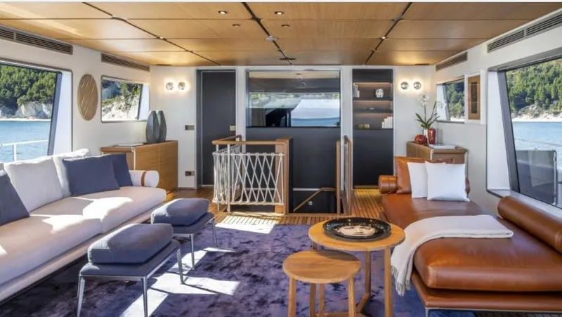  Yacht Photos Pics Luxurious interior of 2023 Custom Line Navetta 30 yacht with modern furnishings and scenic views.