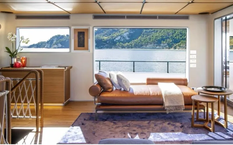  Yacht Photos Pics Luxurious interior of 2023 Custom Line Navetta 30 yacht with scenic ocean view.