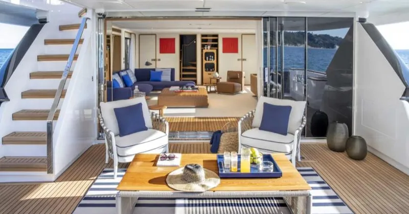  Yacht Photos Pics Luxurious 2023 Custom Line Navetta 30 yacht interior with elegant seating and ocean view.