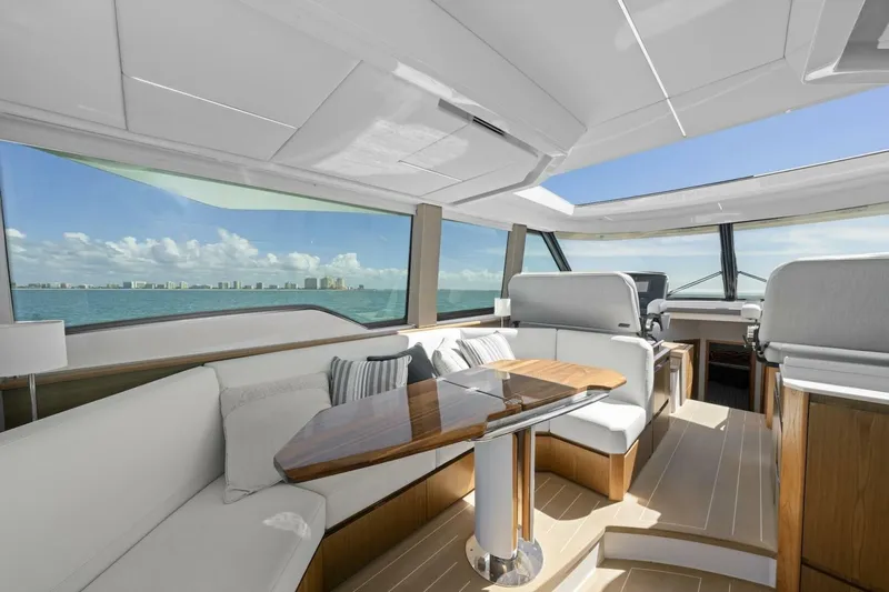 Tranquil Moments II Yacht Photos Pics Luxurious interior of 2023 Tiara Yachts EX 60 with panoramic ocean view.