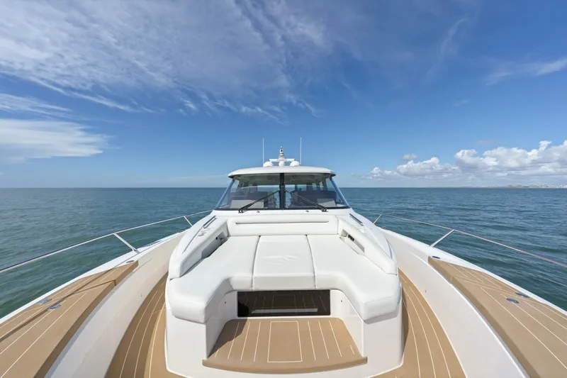 Tranquil Moments II Yacht Photos Pics 2023 Tiara Yachts EX 60 luxury yacht on open sea under blue sky.
