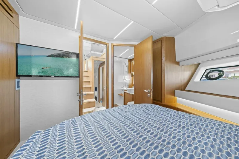 Tranquil Moments II Yacht Photos Pics Luxurious 2023 Tiara Yachts EX 60 cabin interior with modern design and amenities.