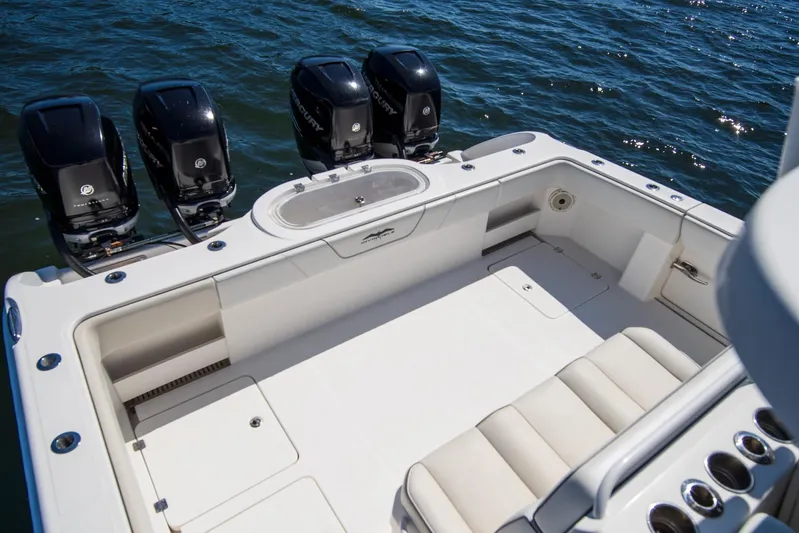  Yacht Photos Pics 2019 Invincible 37 Catamaran with four outboard engines on open water.