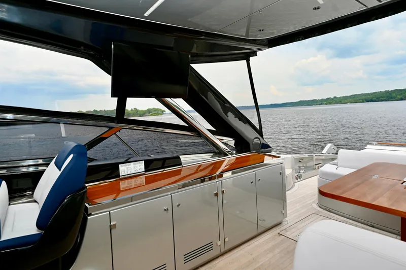 Maximus Yacht Photos Pics Luxurious interior of the 2023 Riva 56 Rivale yacht with lake view.