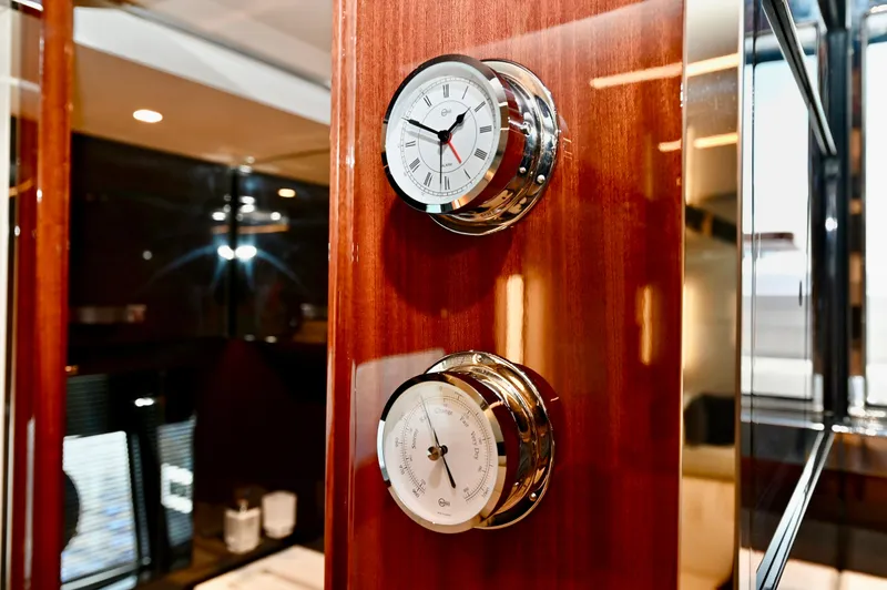 Maximus Yacht Photos Pics Luxury interior of 2023 Riva 56 Rivale yacht with clock and barometer.