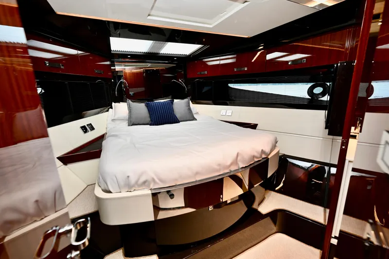 Maximus Yacht Photos Pics Luxurious bedroom interior of 2023 Riva 56 Rivale yacht with modern design.