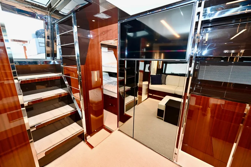 Maximus Yacht Photos Pics Luxurious interior of 2023 Riva 56 Rivale yacht with modern design and high-end finishes.