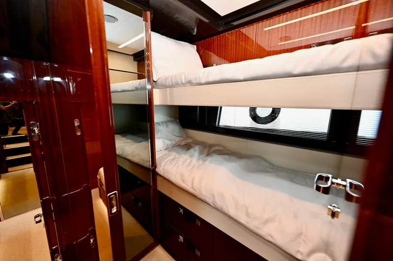 Maximus Yacht Photos Pics 2023 Riva 56 Rivale yacht interior with bunk beds.