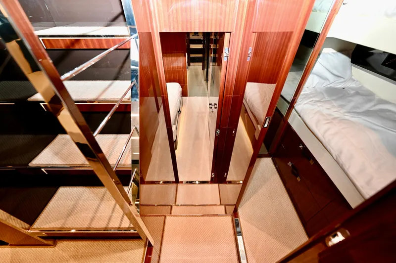 Maximus Yacht Photos Pics Interior cabin of 2023 Riva 56 Rivale yacht with luxurious wood finish.