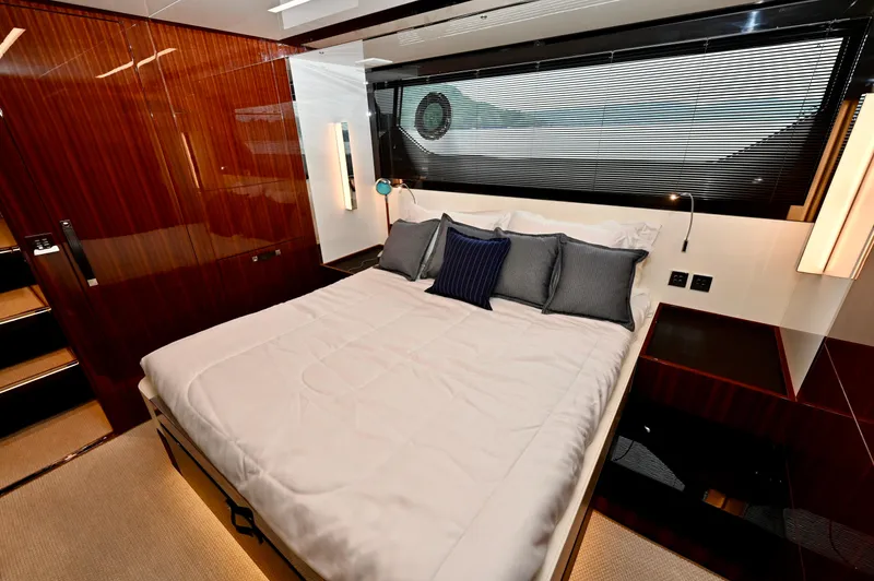 Maximus Yacht Photos Pics Luxurious bedroom interior of 2023 Riva 56 Rivale yacht with modern design.